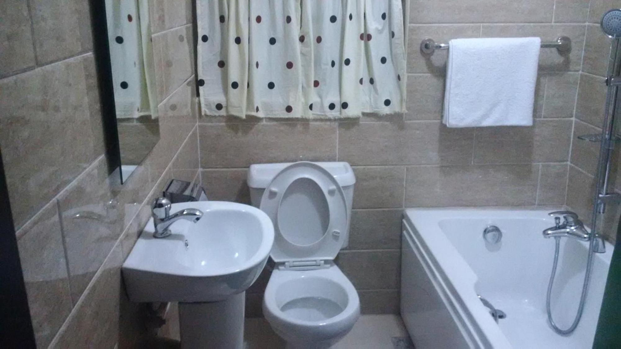 Haute Aparthotel Ikeja Habitación foto