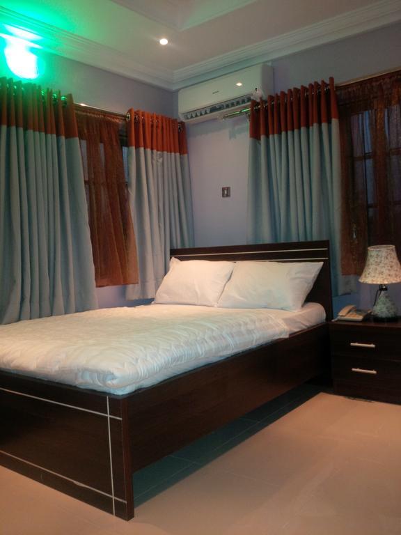 Haute Aparthotel Ikeja Habitación foto